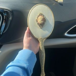 I’m selling a 1950’s hair set Mirror, Comb, And brush